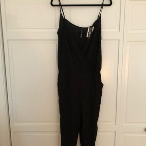 Woman’s black jumpsuit size large